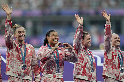 Canadian Rugby Sevens team celebrate with their silver medals